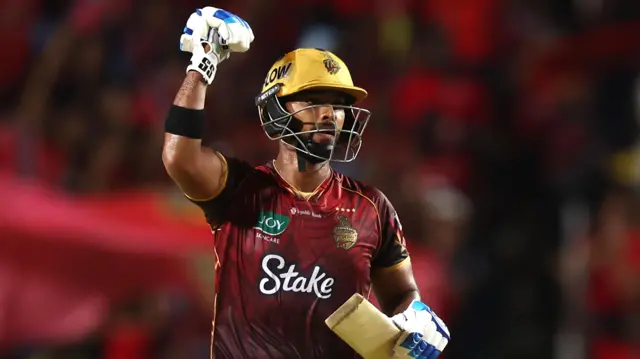 Nicholas Pooran celebrates helping Trinbago Knight Riders beat Barbados Royals