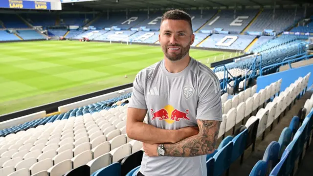 Stuart Dallas poses at Elland Road after being named a Leeds club ambassador