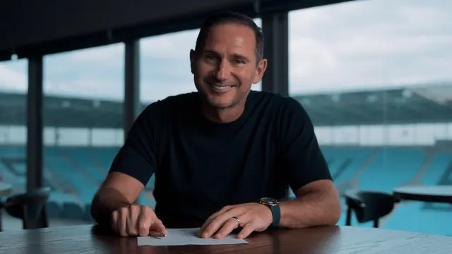 Frank Lampard signs his Coventry contract and smiles