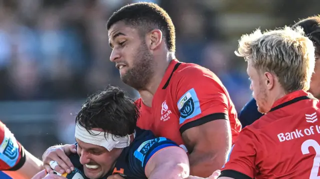 Ulster's Cormac Izuchukwu is tackled by Edinburgh's Ben Muncaster