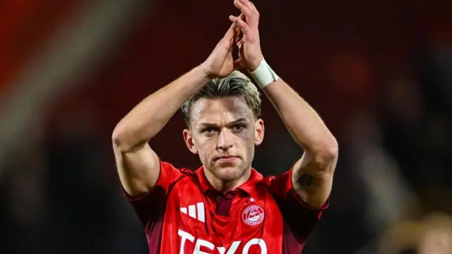Aberdeen's Jesper Karlsson applauds the fans at full time during a William Hill Premiership match between Aberdeen and Dundee United at Pittodrie Stadium, on December 27