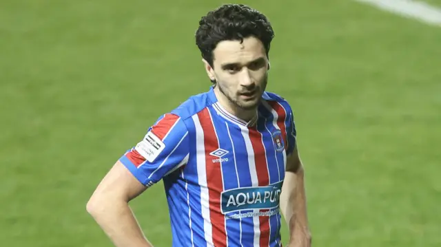 Alex Gilliead during a game for Carlisle United