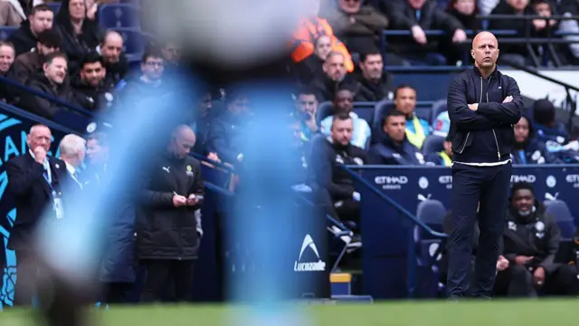 Arne Slot on the touchline against Manchester City