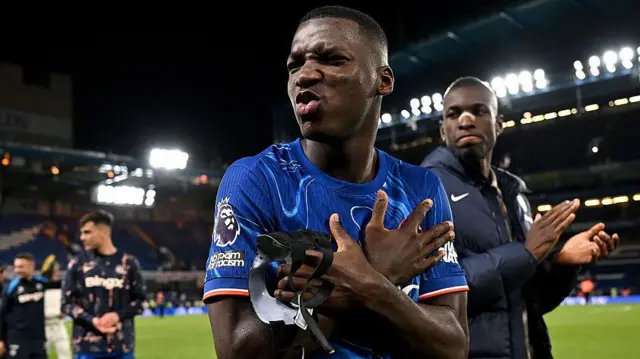 Moises Caicedo celebrates victory over Manchester United