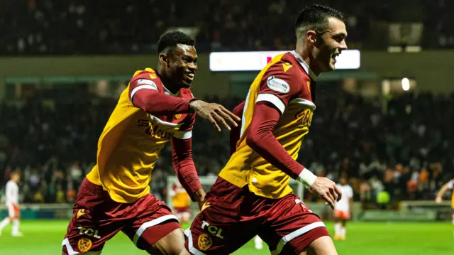 Motherwell's Moses Ebiye and Lennon Miller celebrate