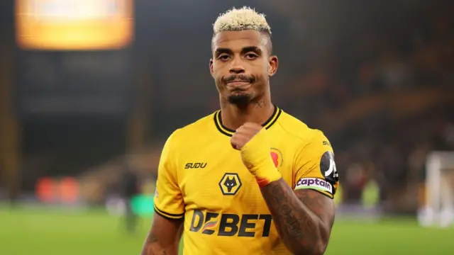 Mario Lemina celebrates a victory for Wolves