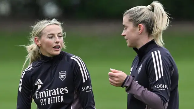 Chloe Kelly and Alessia Russo chat in training