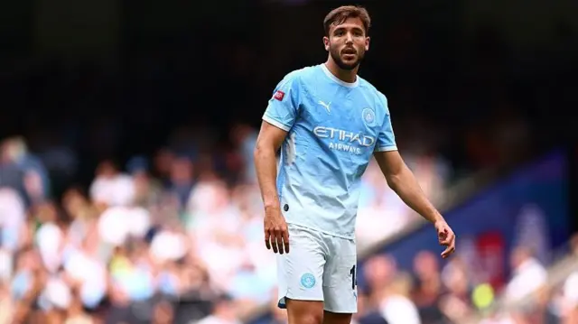 Nico Gonzalez of Manchester City looks on