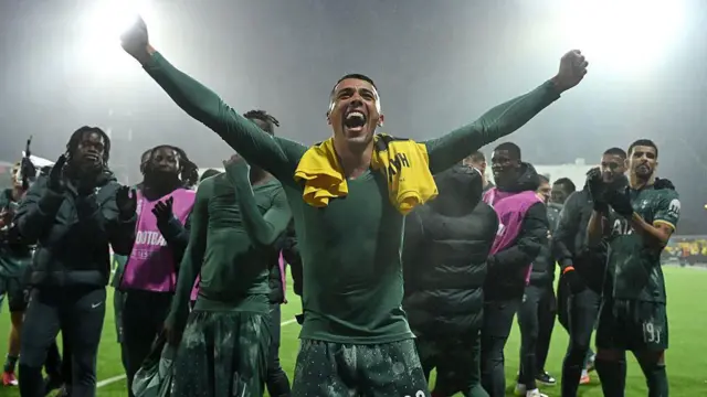 Pedro Porro celerbates victory with Tottenham
