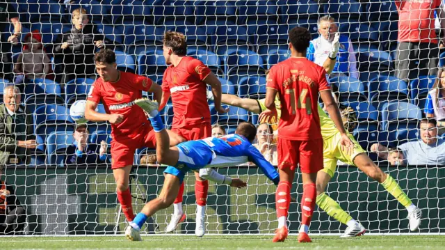 Blackburn Rovers' Todd Cantwell scores a goal past several Middlesbrough defenders in their Championship match on Saturday