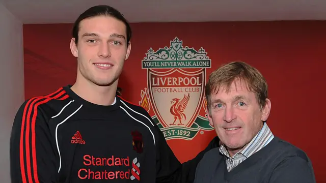 Andy Carroll and Liverpool manager Sir Kenny Dalglish on the day the striker moved to Anfield