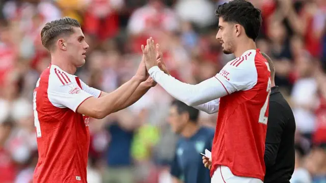 Viktor Gyokeres of Arsenal high fives Kai Havertz following substitution during the pre-season friendly match between Arsenal and Athletic Club at Emirates Stadium