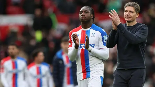 Jaydee Canvot and Oliver Glasner applaud fans