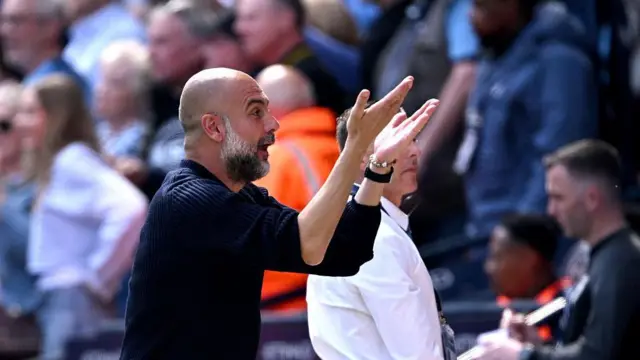 Pep Guardiola managing Manchester City