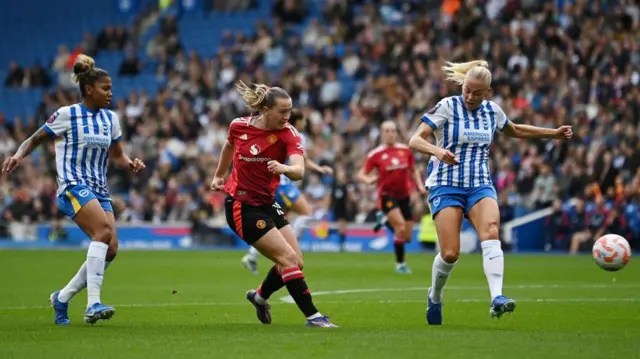 Manchester United striker Elisabeth Terland shoots during a 1-1 draw against Brighton & Hove Albion in the WSL.