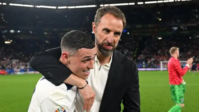 Gareth Southgate embraces Phil Foden