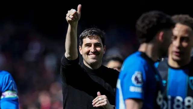 Andoni Iraola celebrates after his side's win against Arsenal.