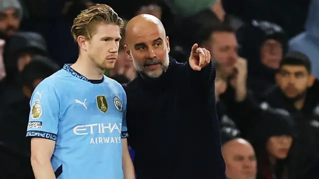 Kevin de Bruyne and Pep Guardiola