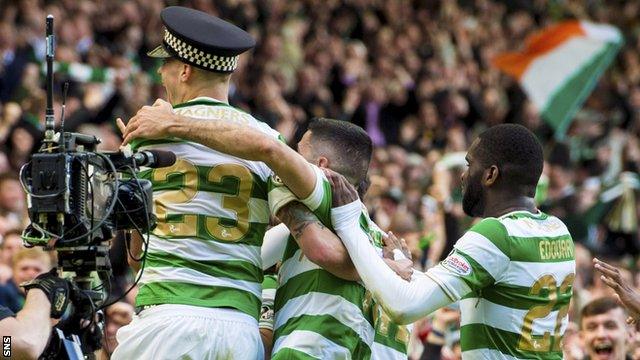 Celtic defender Mikael Lustig celebrates