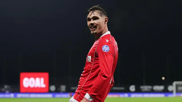 Wrexham defender Callum Doyle celebrates
