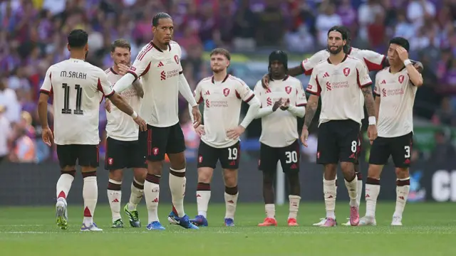 Liverpool players during the penalty shootout 