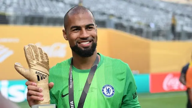 Robert Sanchez holds Club World Cup Golden Glove award