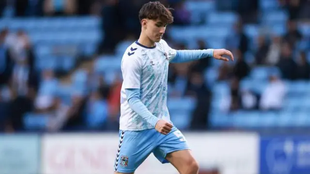 Aidan Dausch warms up ahead of Coventry's game with Ipswich Town