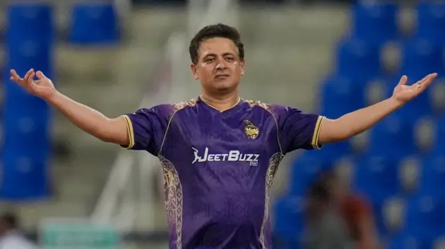 Abu Dhabi Knight Riders spinner Piyush Chawla celebrates taking a wicket