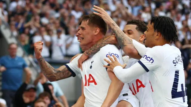 Tottenham players celebrate Micky van de Ven's winner against Burnley