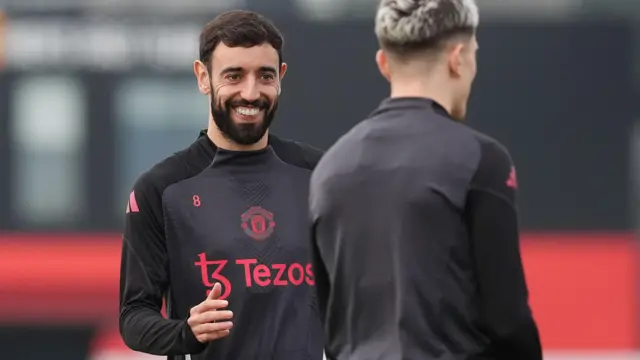 Bruno Fernandes smiles during a Manchester United training session