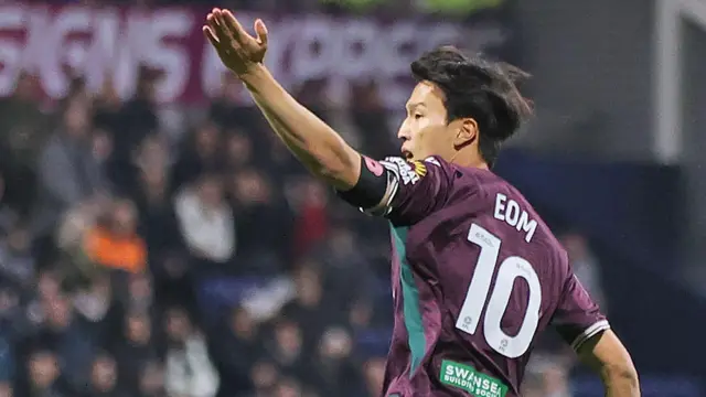 Eom Jisung celebrates Swansea's goal at Preston in midweek 