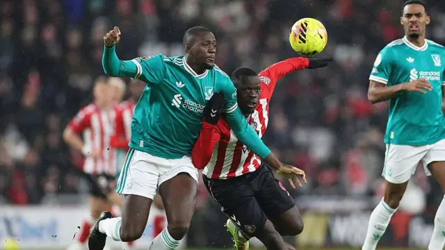 Brian Brobbey of Sunderland and Ibrahima Konate of Liverpool battle for possession of the ball during the Premier League match between Sunderland and Liverpool at Stadium of Light