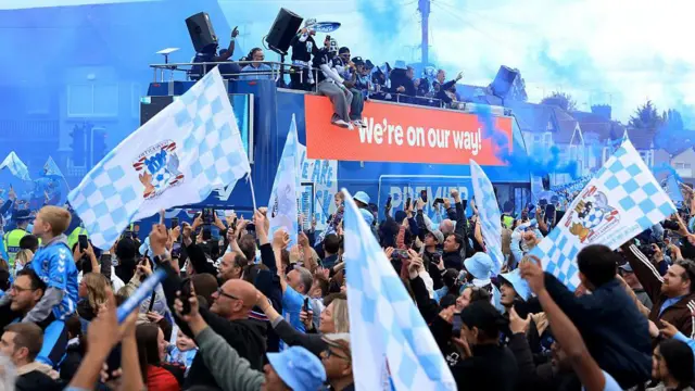 A general view as players of Coventry City celebrate on an open tour bus