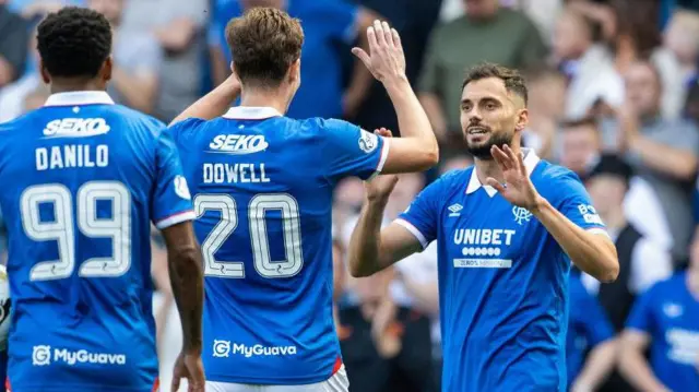 Nedim Bajrami and Kieran Dowell, with Danilo (left)