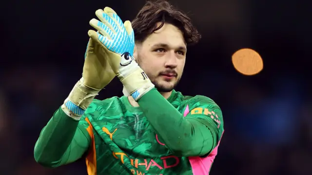 James Trafford applauds