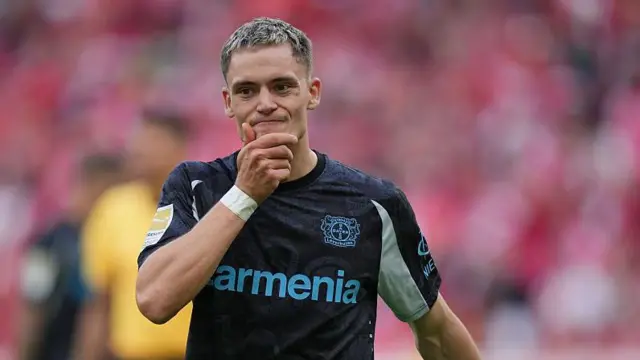 Florian Wirtz looks on for Liverpool