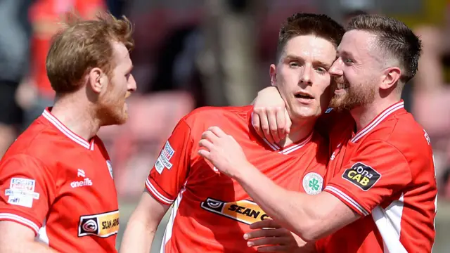 Ryan Curran (centre) celebrates his goal against Portadown on Sunday