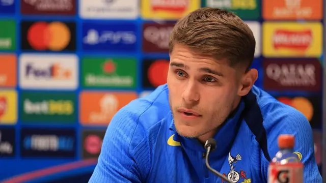 Micky van de Ven of Tottenham Hotspur talks to the media during a Press Conference