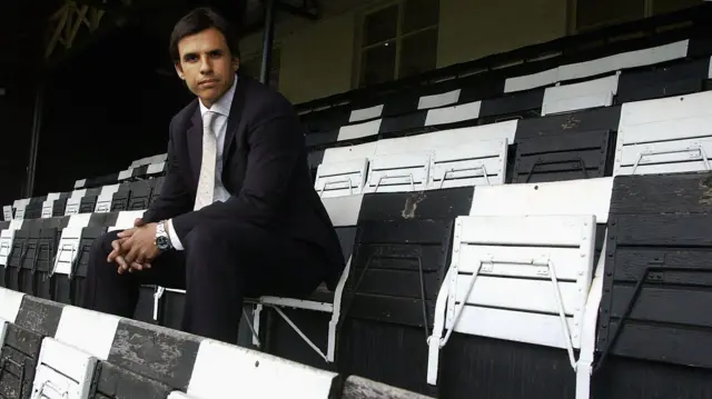 Chris Coleman sits in the stand