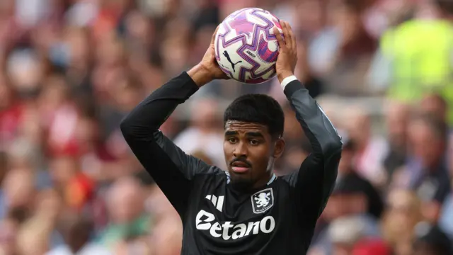 Ian Maatsen taking a throw-in for Aston Villa