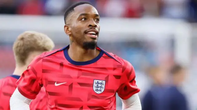 Ivan Toney warms up before an England match