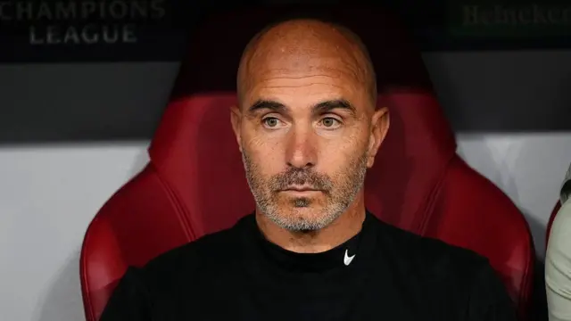 Enzo Maresca sitting in the dugout