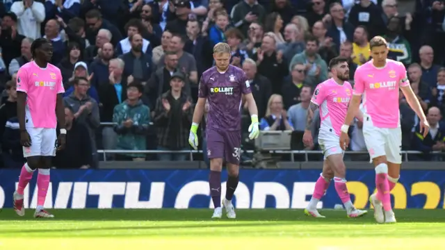 Southampton players stand dejected