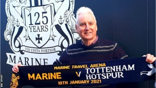Chairman of non-league club Marine Paul Leary with a half-and-half scarf before their FA Cup third round tie with Tottenham Hotspur