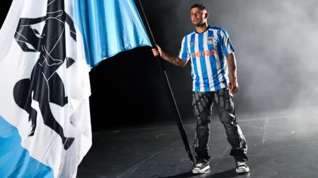 Hamer posing with Coventry City flag 