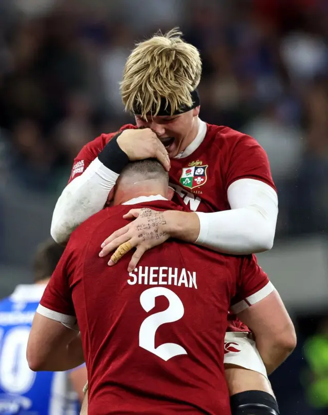 Dan Sheehan celebrates scoring a try with Henry Pollock 