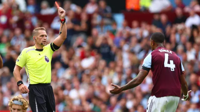 Ezri Konsa red card 