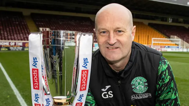 Hibernian Head Coach Grant Scott with the Sky Sports Cup trophy during a press conference ahead of the Sky Sports Cup Final at Fir Park