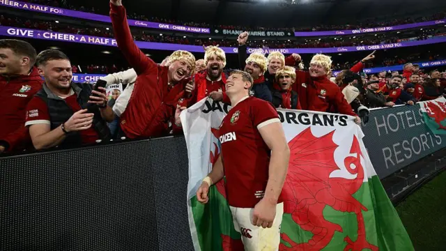 Jac Morgan celebrates victory with supporters.