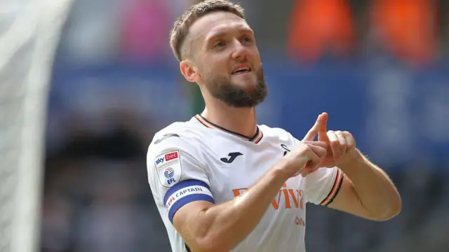 Matt Grimes celebrates earlier this season